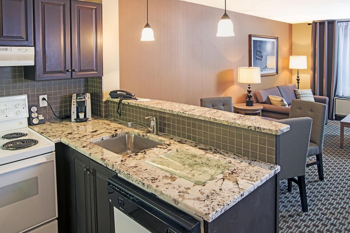 coffee/tea maker, toaster, dining tables