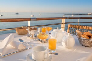 Breakfast, lunch, dinner served; Portuguese cuisine, beach views