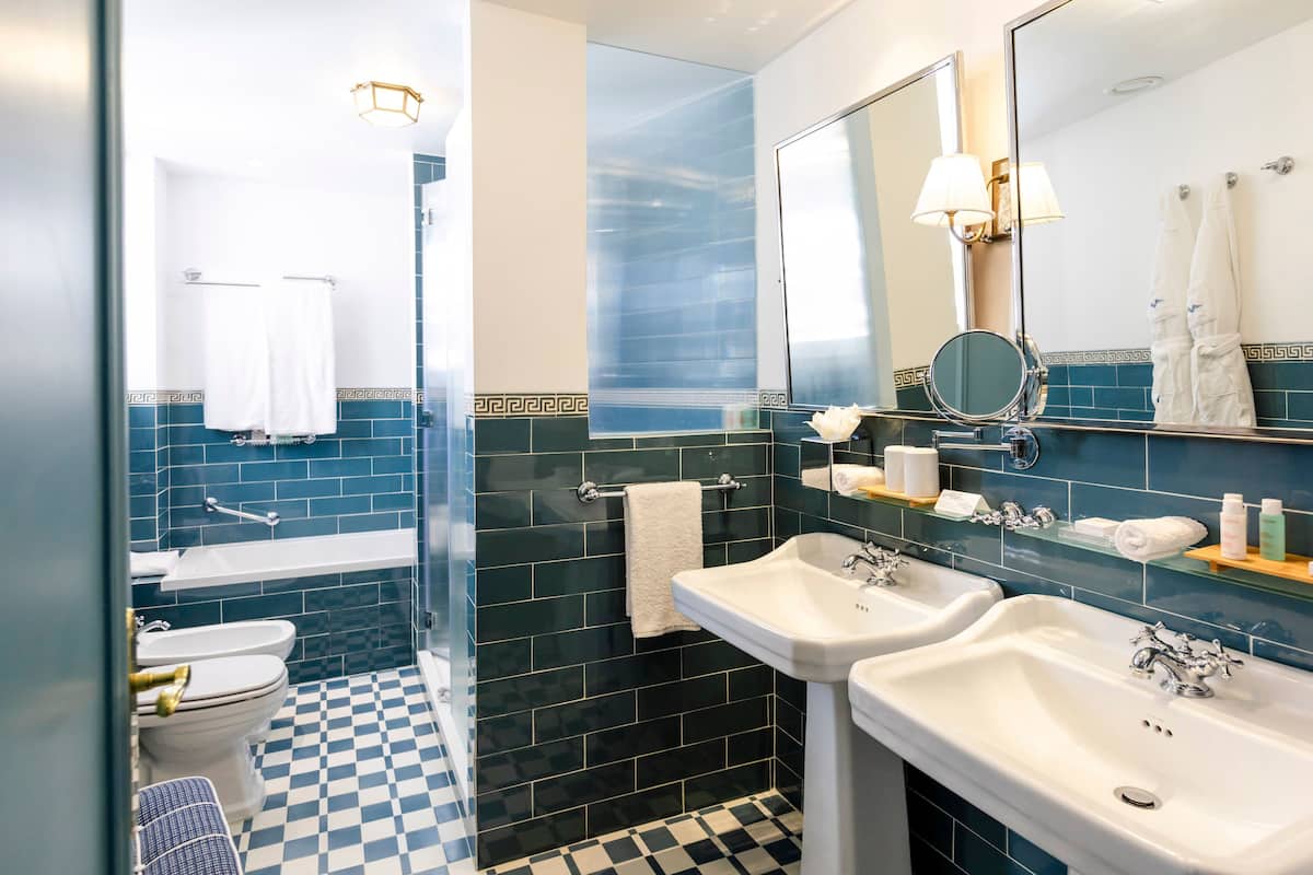 suite, sea view | bathroom | free toiletries, hair dryer, bathrobes, slippers