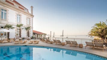 Outdoor pool, pool umbrellas, pool loungers