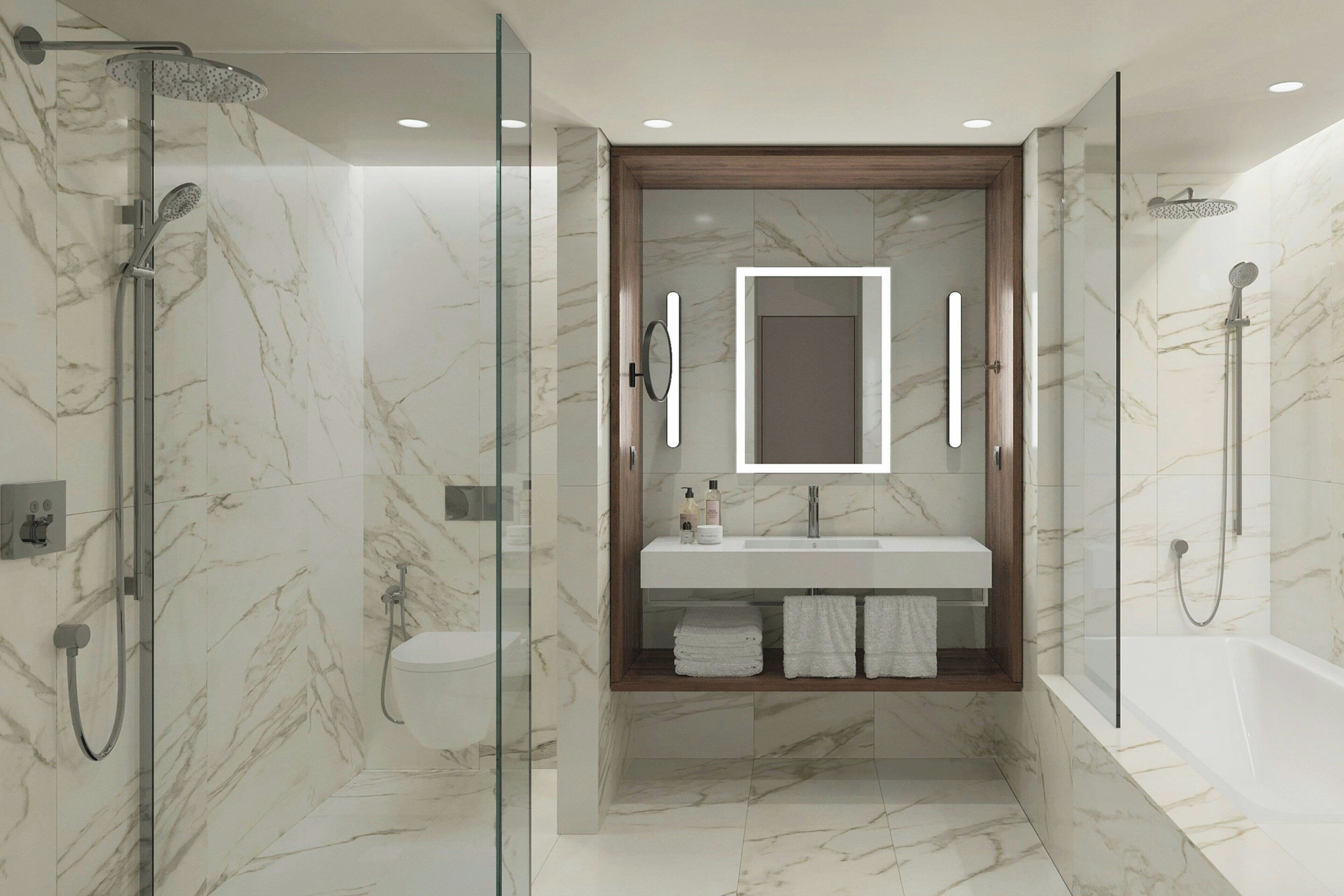 junior suite, 1 king bed, balcony | bathroom | combined shower/bathtub, free toiletries, hair dryer, towels