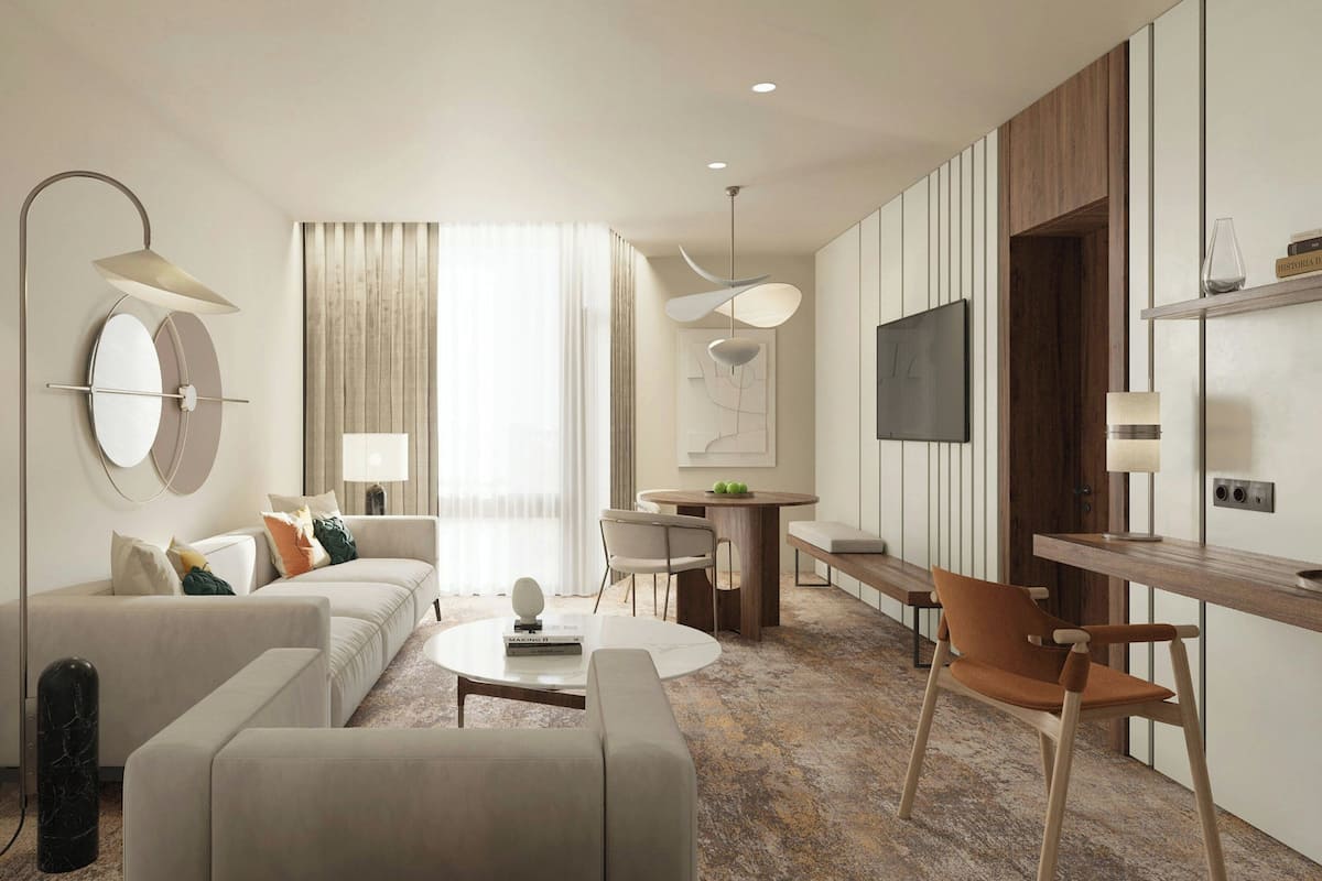 Suite Junior, 1 Tempat Tidur King, balkon | Ruang keluarga | Televisi LCD 32-inci dengan saluran TV satelit dan TV