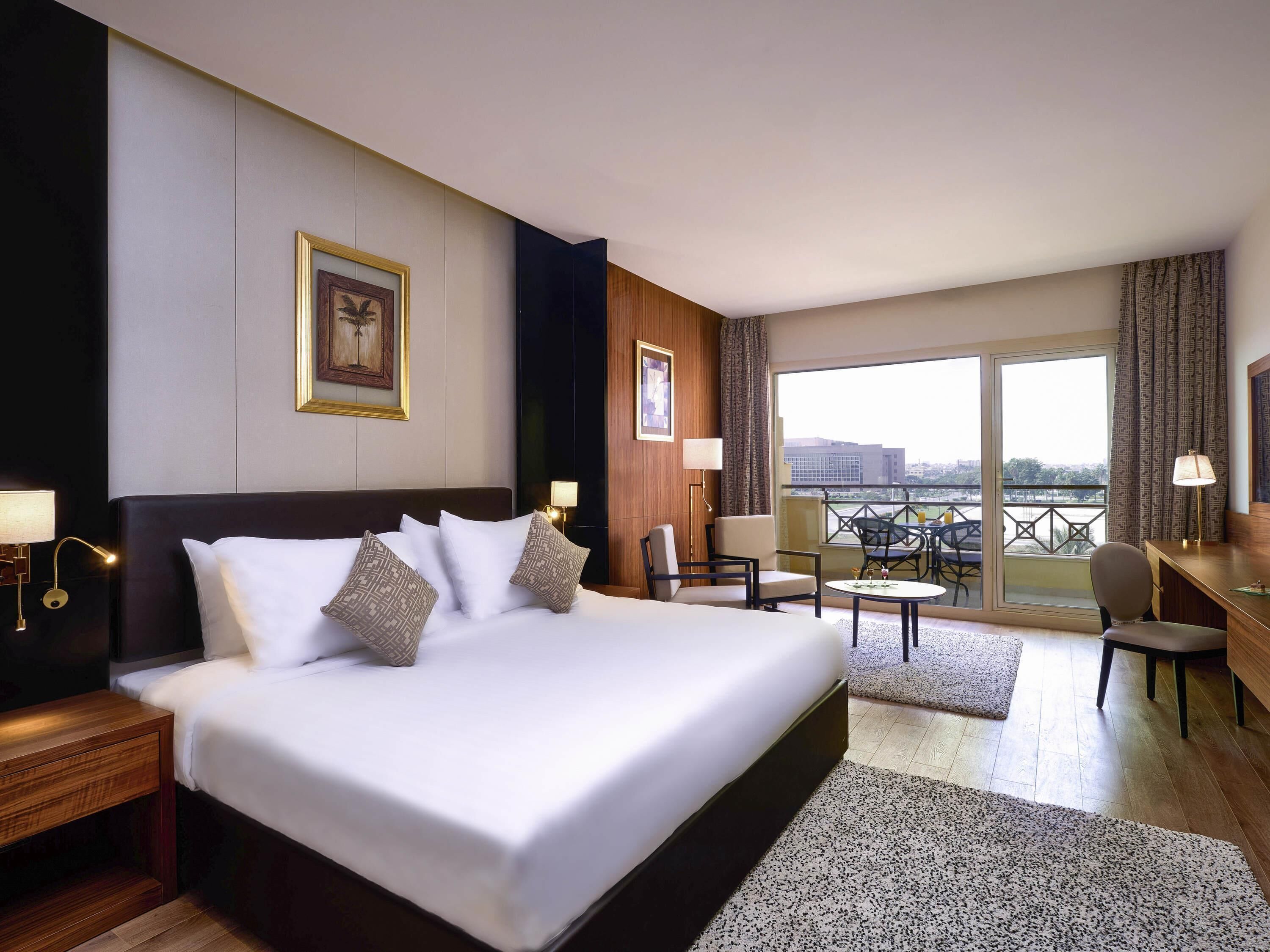 Habitación ejecutiva, 1 cama King size, vista a la ciudad | Ropa de cama de alta calidad, camas con efecto memoria y minibar 