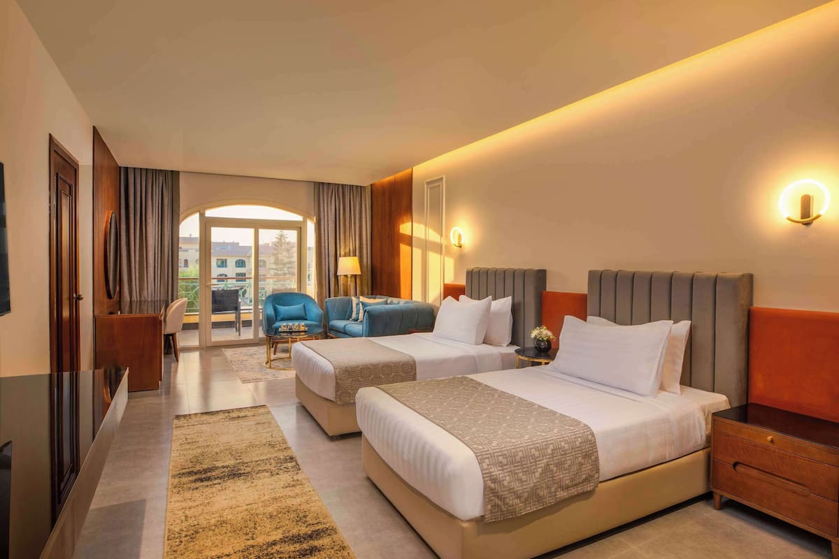 Premium bedding, memory foam beds, minibar, in-room safe