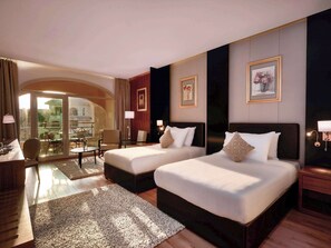 Premium bedding, memory foam beds, minibar, in-room safe
