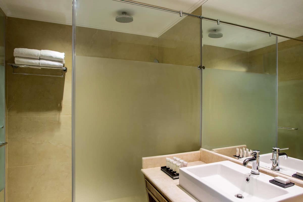 Premium bedding, memory-foam beds, minibar, in-room safe
