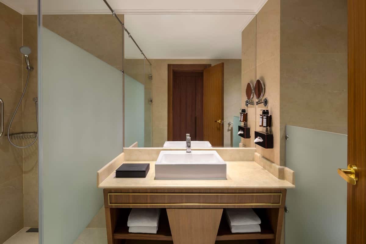 Premium bedding, memory-foam beds, minibar, in-room safe