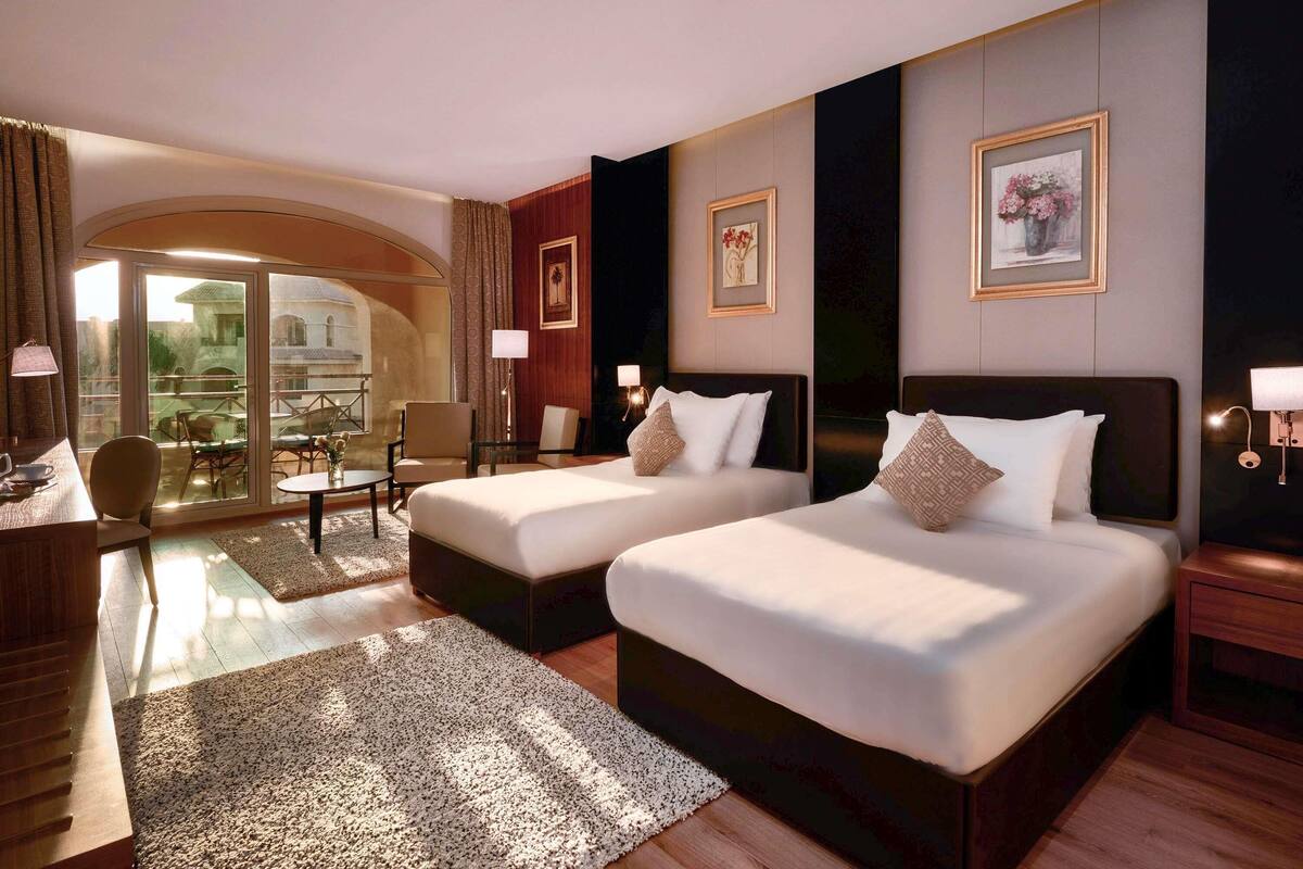 ห้องเอ็กเซกคิวทีฟทวิน, หลายเตียง, วิวสวน | เครื่องนอนระดับพรีเมียม, เตียงเมมโมรีโฟม, มินิบาร์, ตู้นิรภัยในห้องพัก
