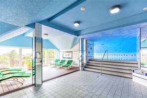 Indoor pool, sun loungers