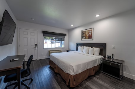 Standard Room, 1 King Bed | Premium bedding, pillowtop beds, desk, blackout drapes. Monterey Surf Inn