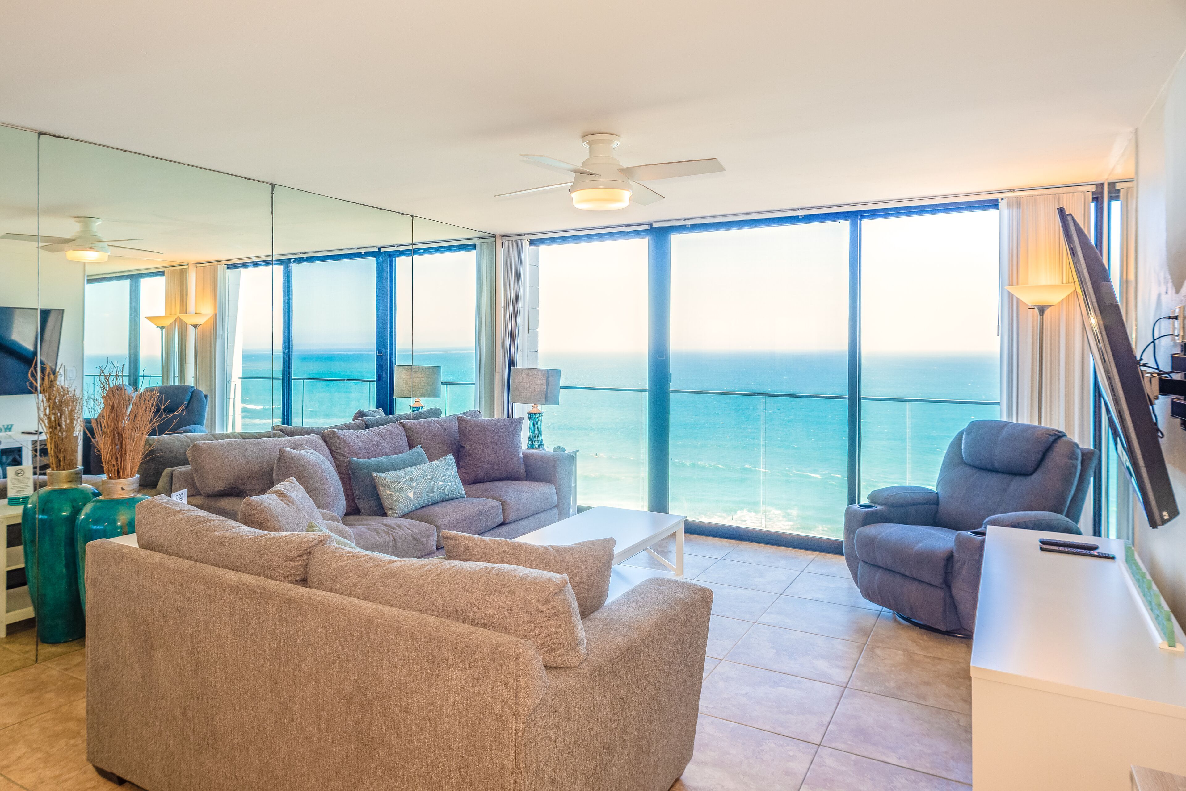 1-Bedroom Condominium - 607 | Living area | 32-inch flat-screen TV with cable channels, TV, DVD player