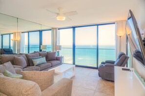 1-Bedroom Condominium - 607 | Living area | 32-inch flat-screen TV with cable channels, TV, DVD player - Capri by the Sea by All Seasons Resort Lodging (San Diego)