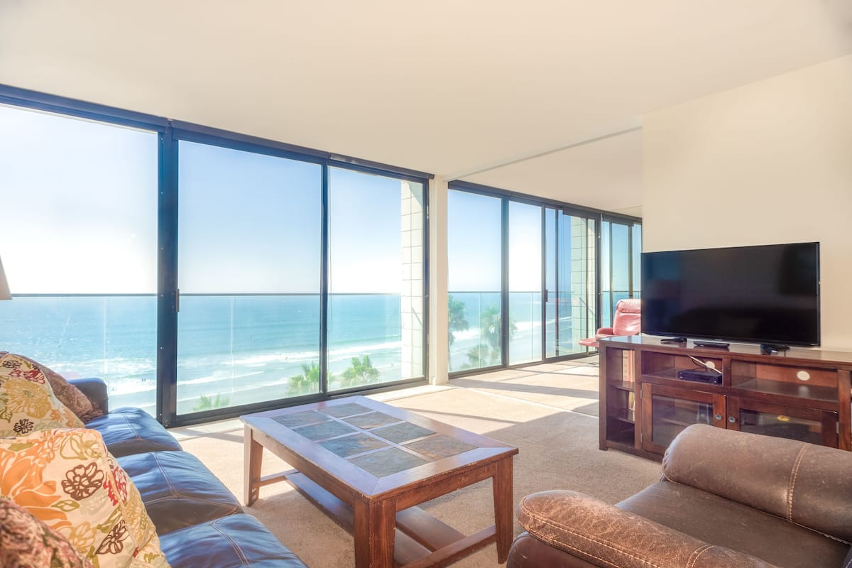 3-Bedroom Condominium - 505 | Living area | 32-inch flat-screen TV with cable channels, TV, DVD player