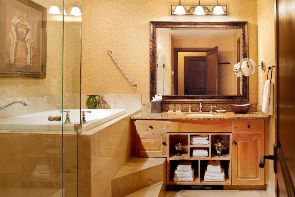 deluxe room, 1 king bed with sofa bed | bathroom | designer toiletries, hair dryer, bathrobes, towels