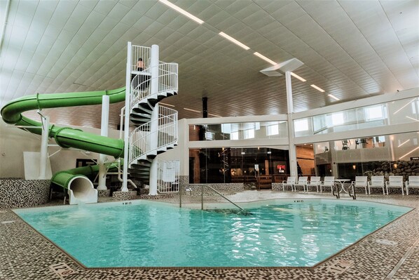 Indoor pool, open 9:00 AM to 10:00 PM, pool loungers