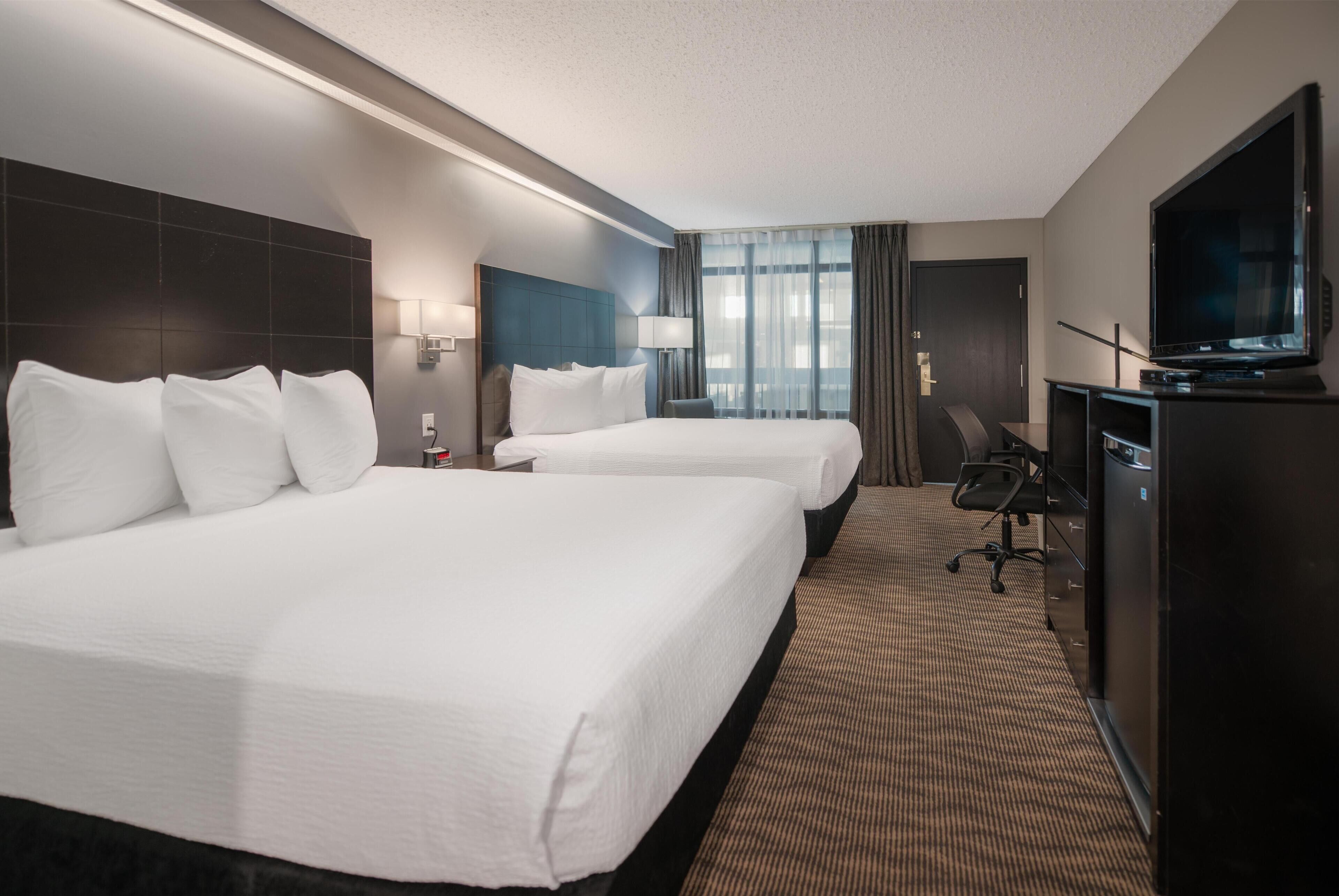 Room, 2 Queen Beds (Coast Two Queens) | Desk, blackout drapes, soundproofing, iron/ironing board