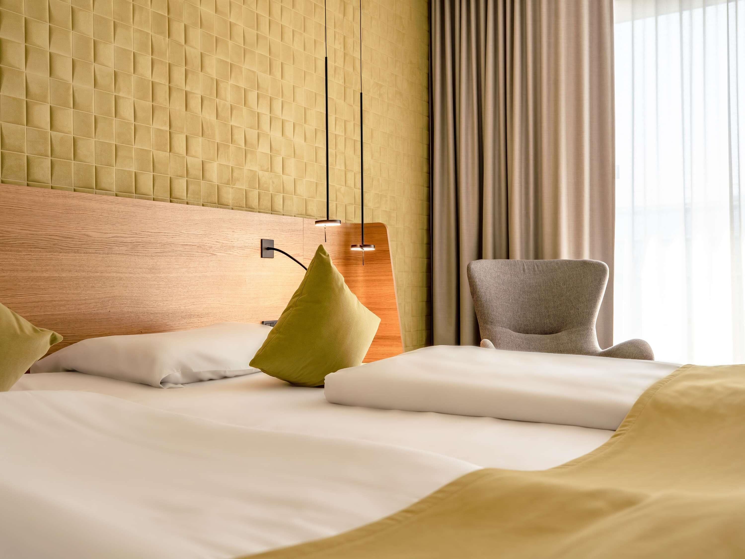 hypo-allergenic bedding, free minibar, in-room safe, blackout curtains