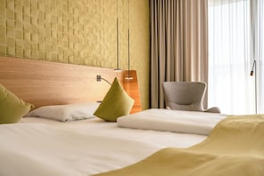 Hypo-allergenic bedding, free minibar, in-room safe, blackout curtains