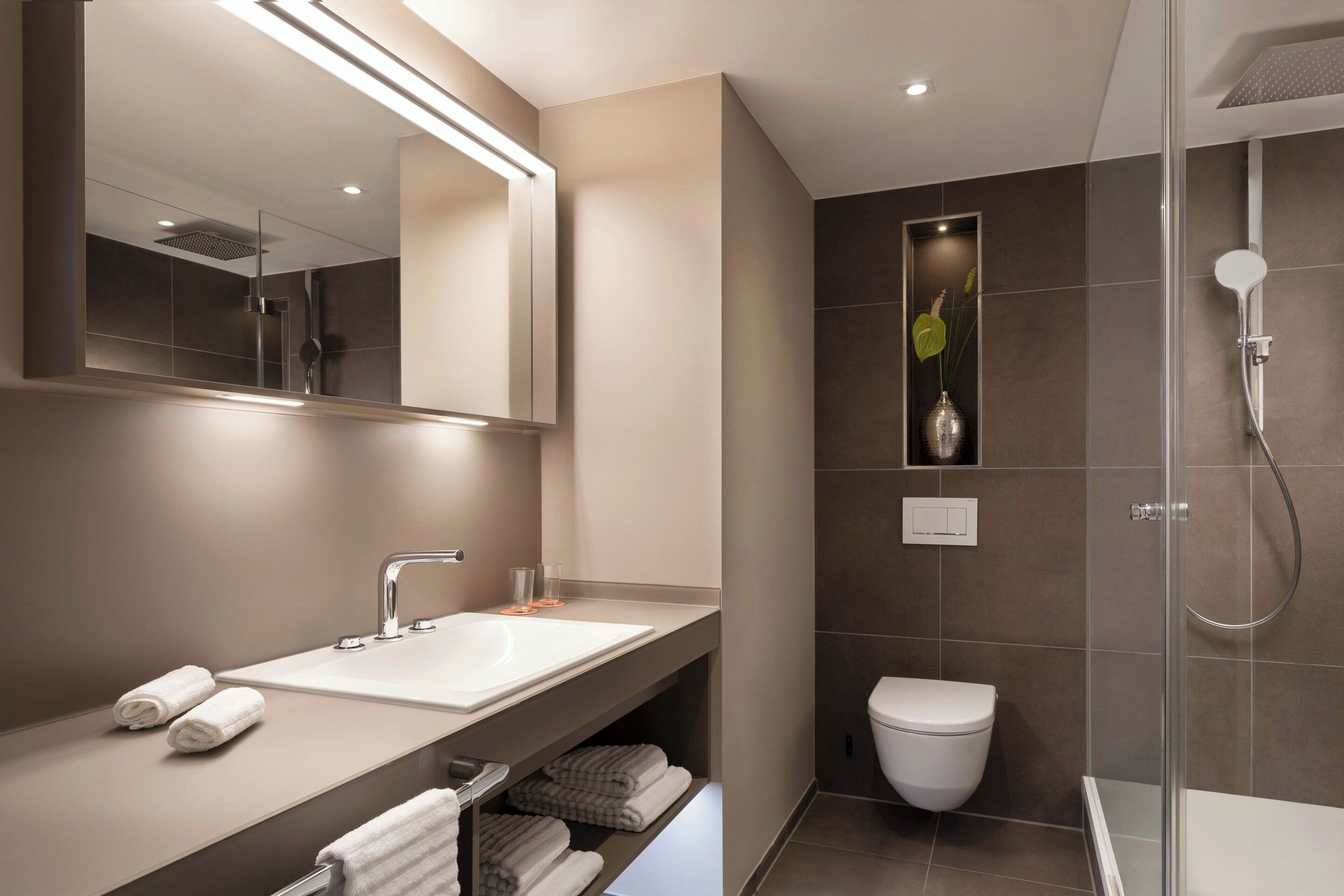 shower, designer toiletries, hair dryer, bathrobes