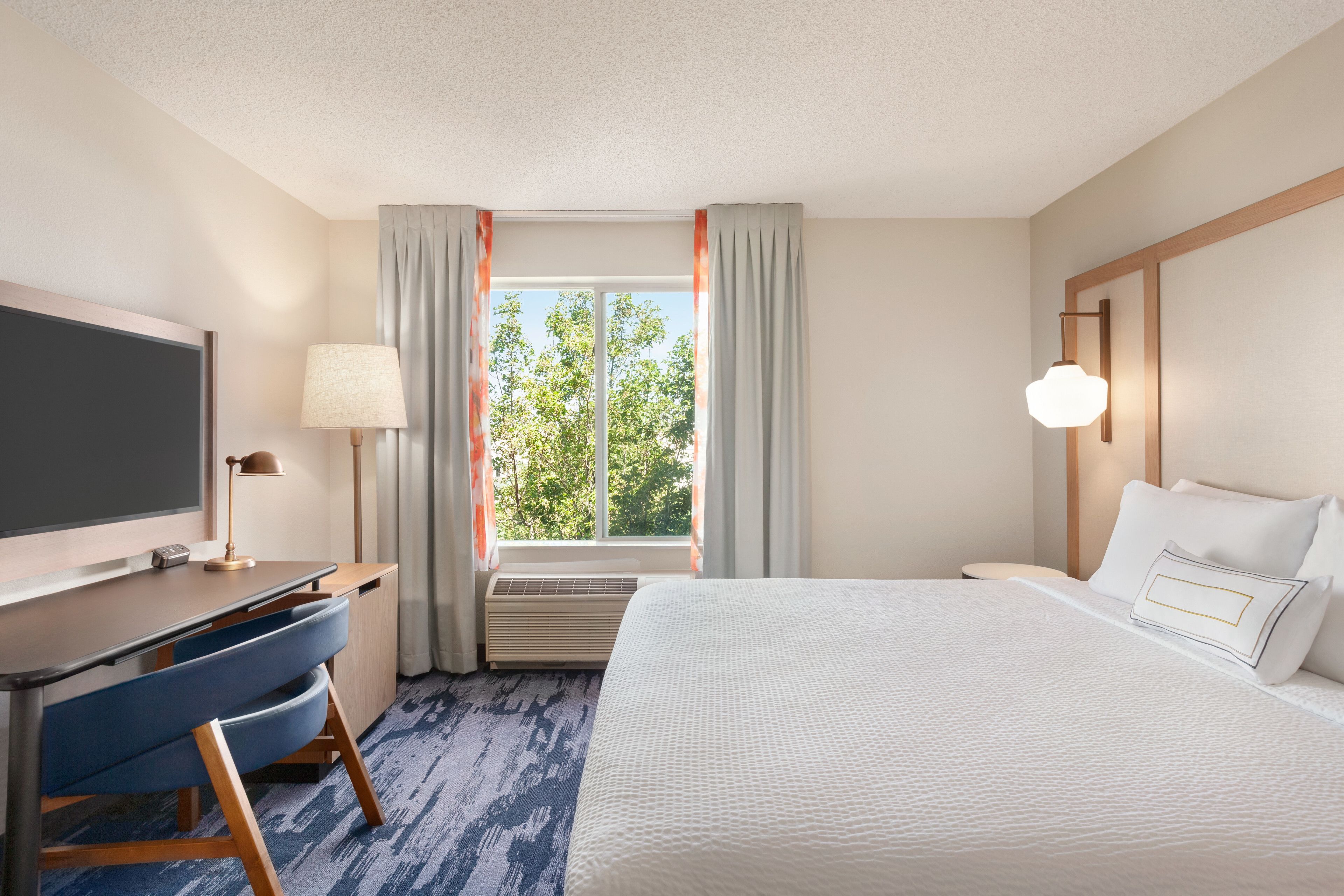 premium bedding, desk, blackout curtains, iron/ironing board