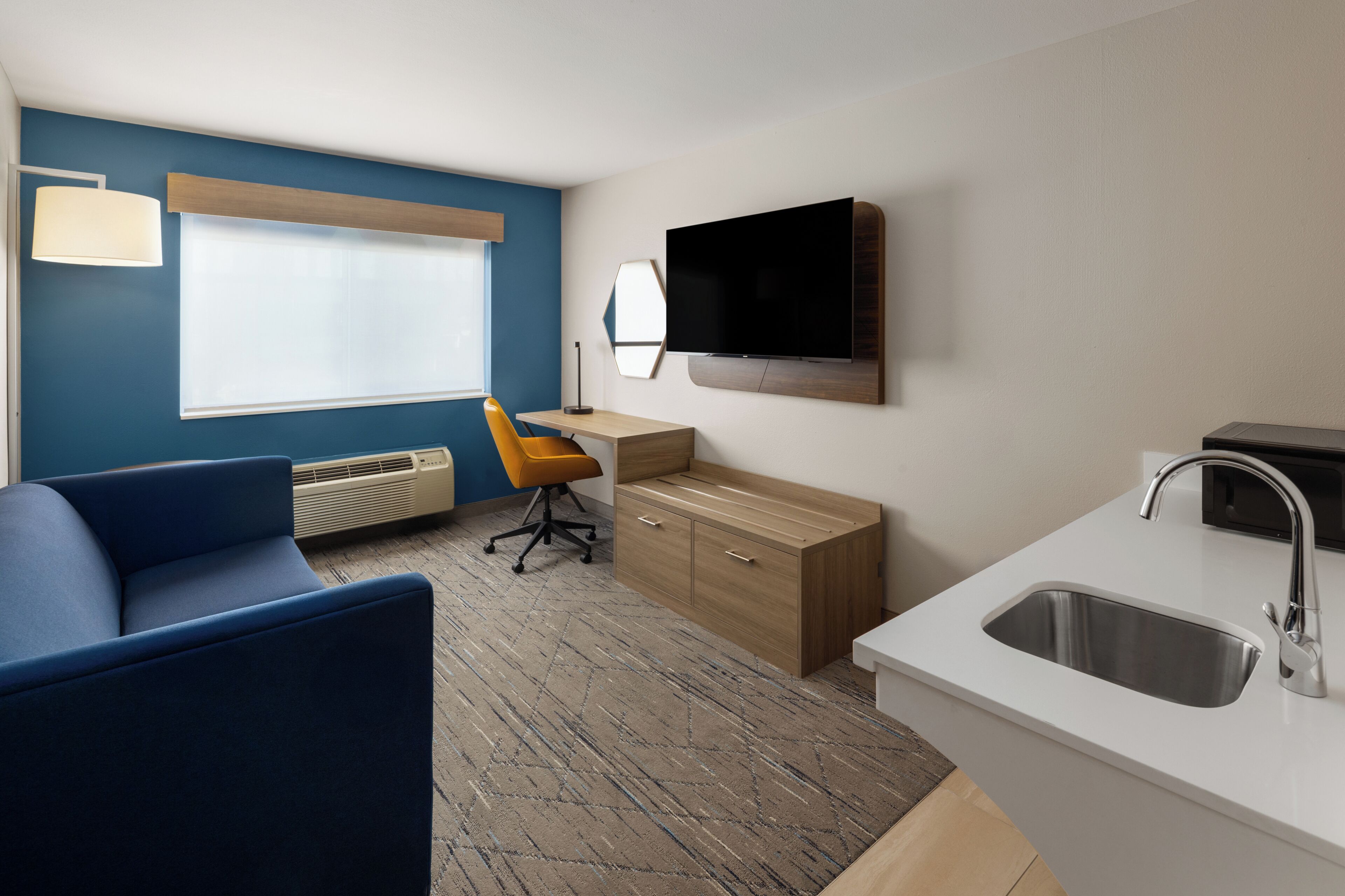 In-room safe, desk, iron/ironing board, cribs (free)