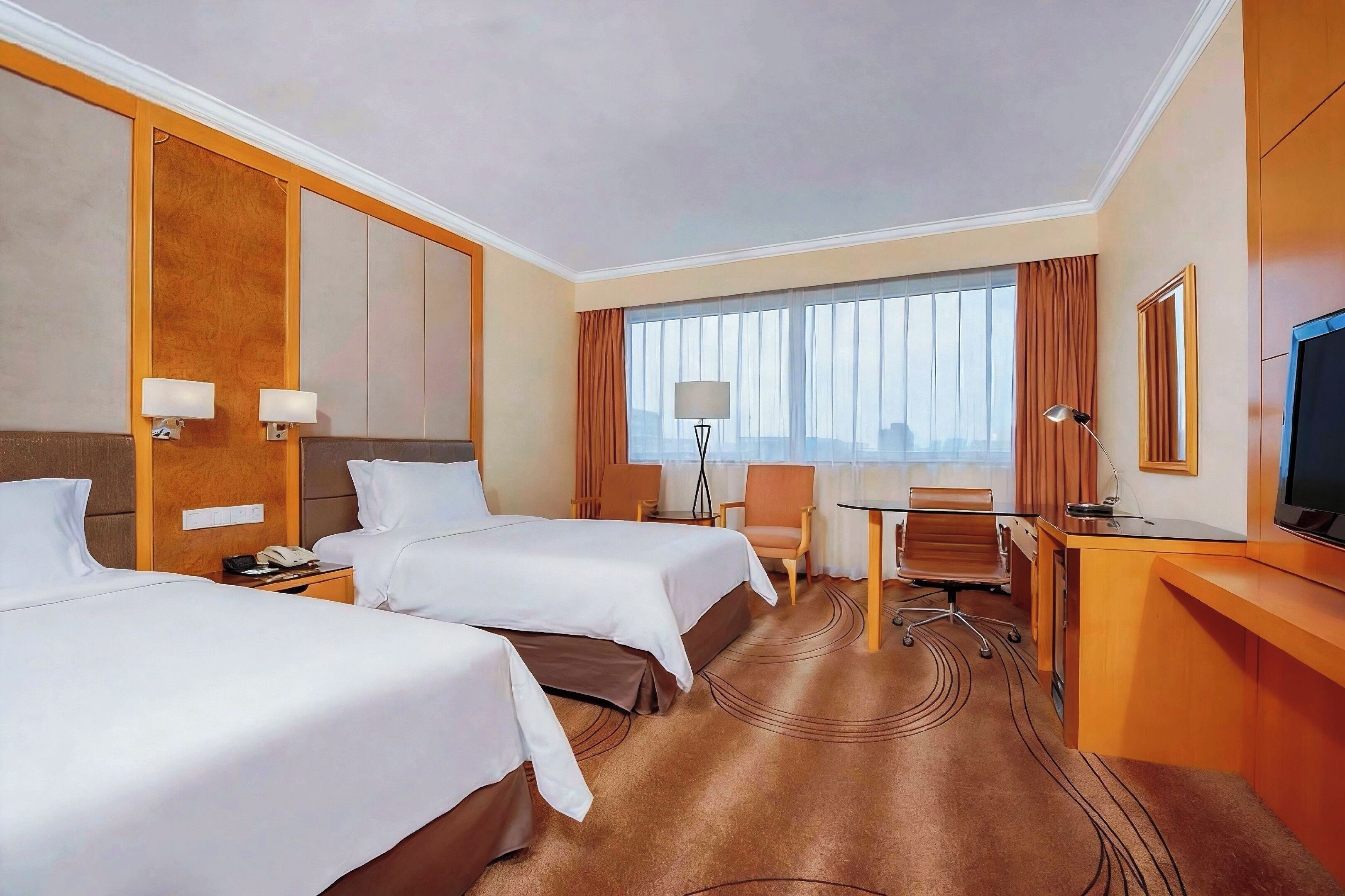 Premium bedding, down comforters, minibar, in-room safe