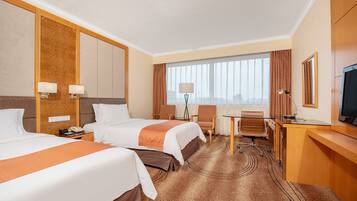 Premium bedding, down comforters, minibar, in-room safe