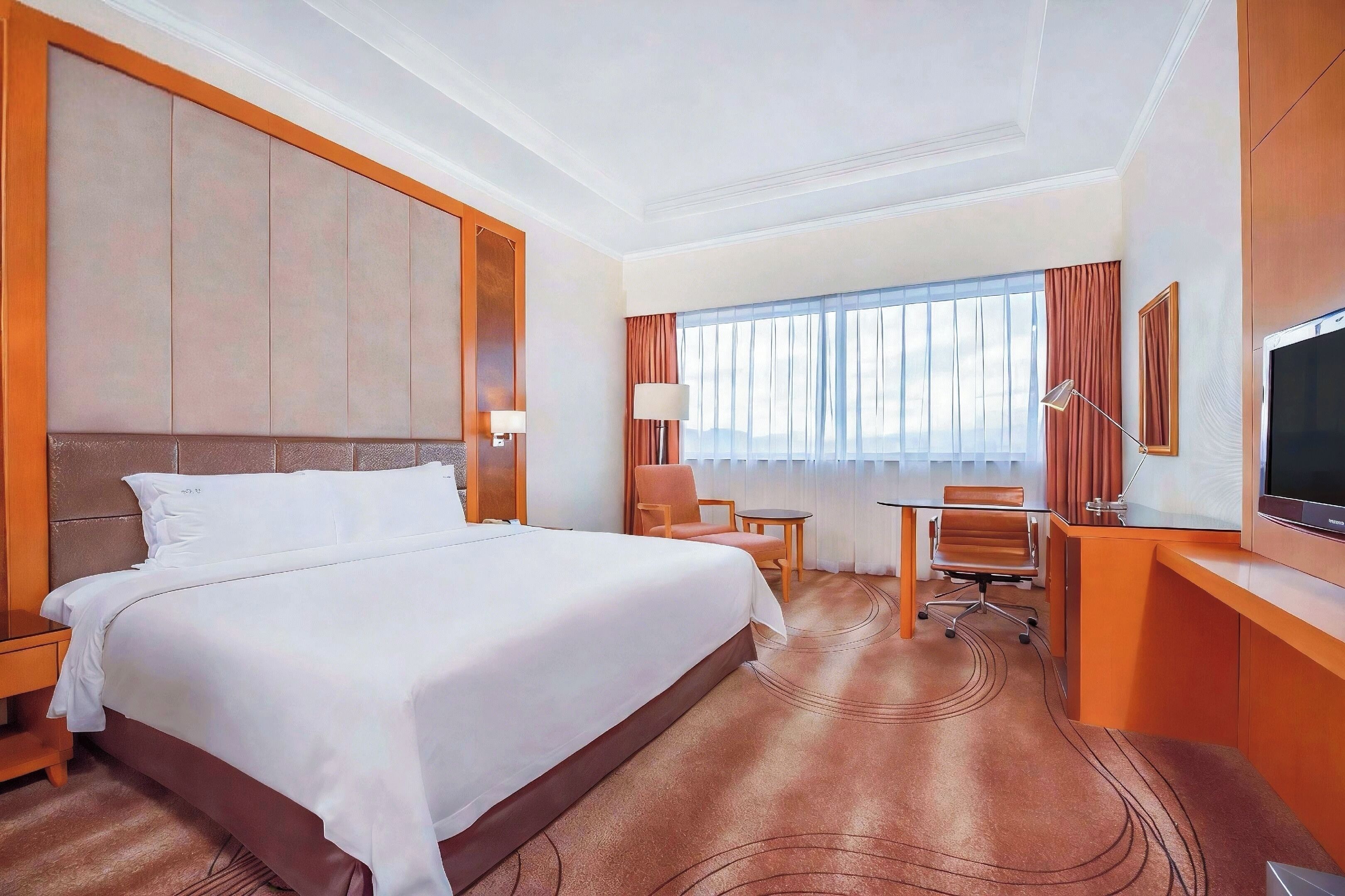Premium bedding, down comforters, minibar, in-room safe