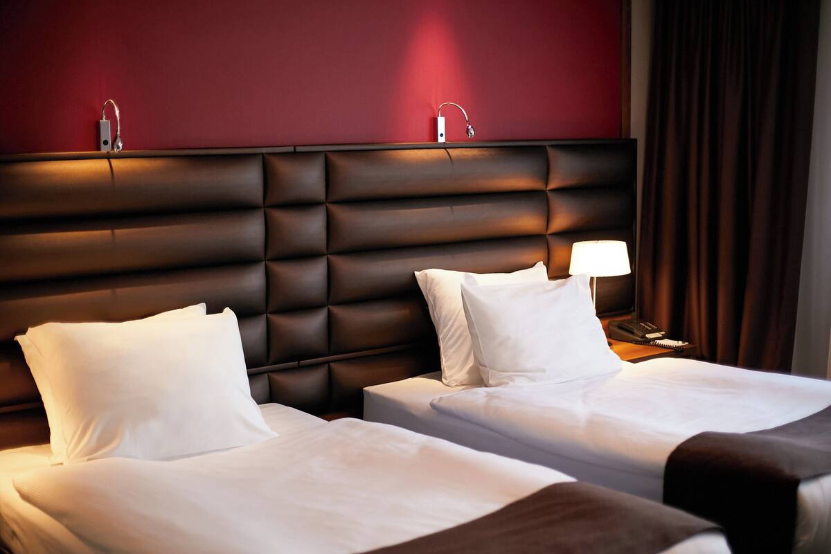 Hypo-allergenic bedding available, in-room safe, desk, laptop workspace