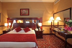 Suite | Down comforters, minibar, in-room safe, individually decorated