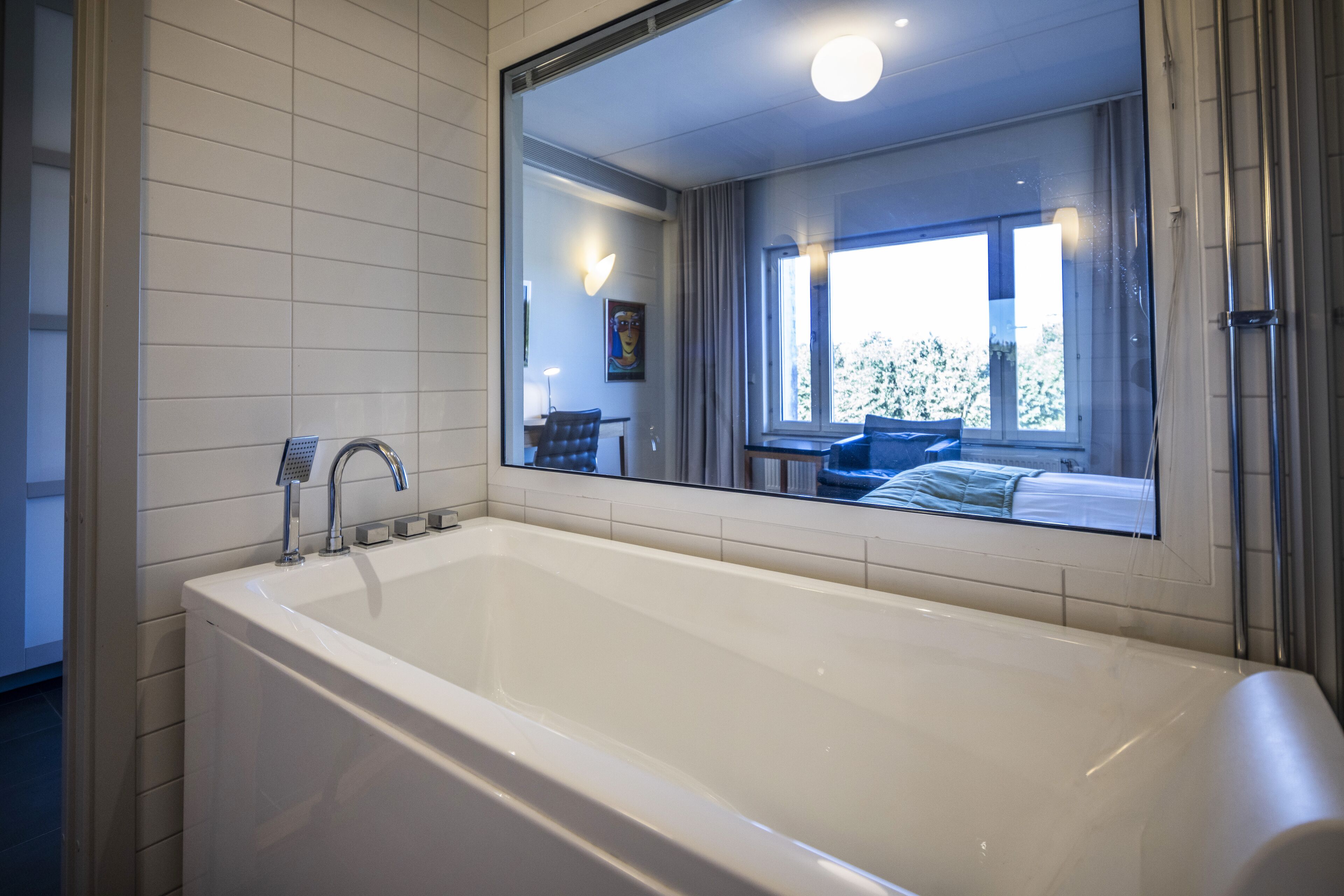 superior double room | bathroom | hair dryer, towels