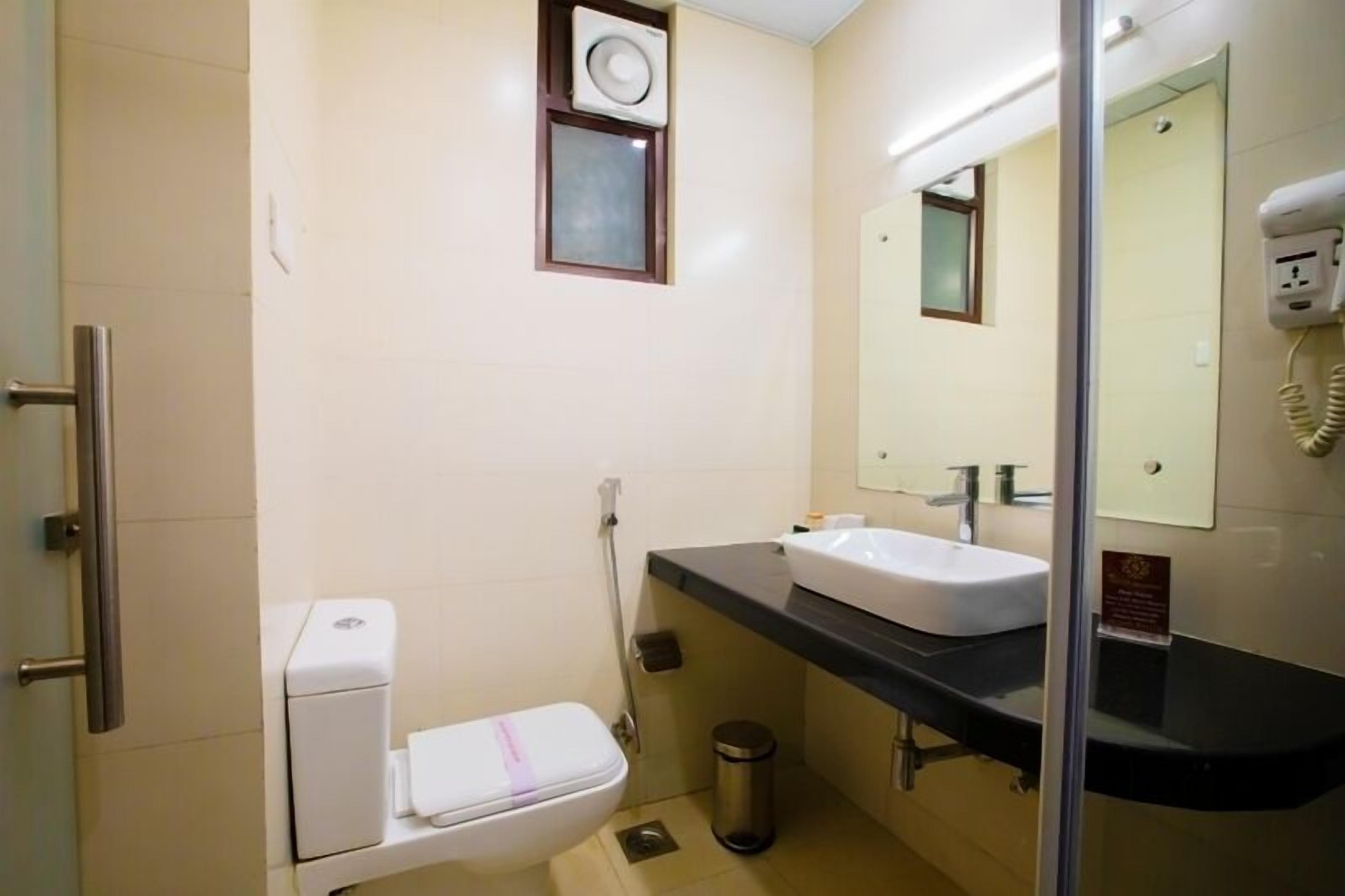 Super deluxe | Bathroom | Separate bathtub and shower, designer toiletries, hair dryer, slippers