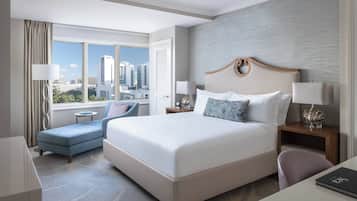 Premium bedding, down comforters, pillowtop beds, minibar