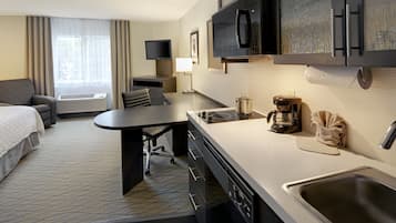 Studio Suite, 1 King Bed | 1 bedroom, in-room safe, desk, iron/ironing board