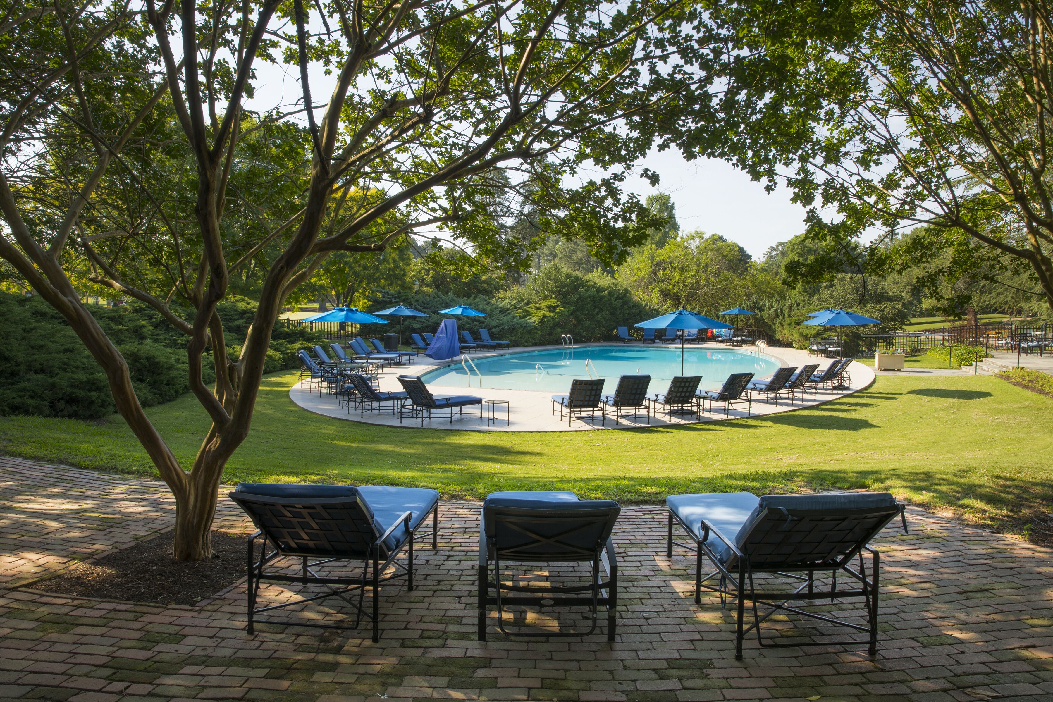 indoor pool, seasonal outdoor pool, pool umbrellas, pool loungers