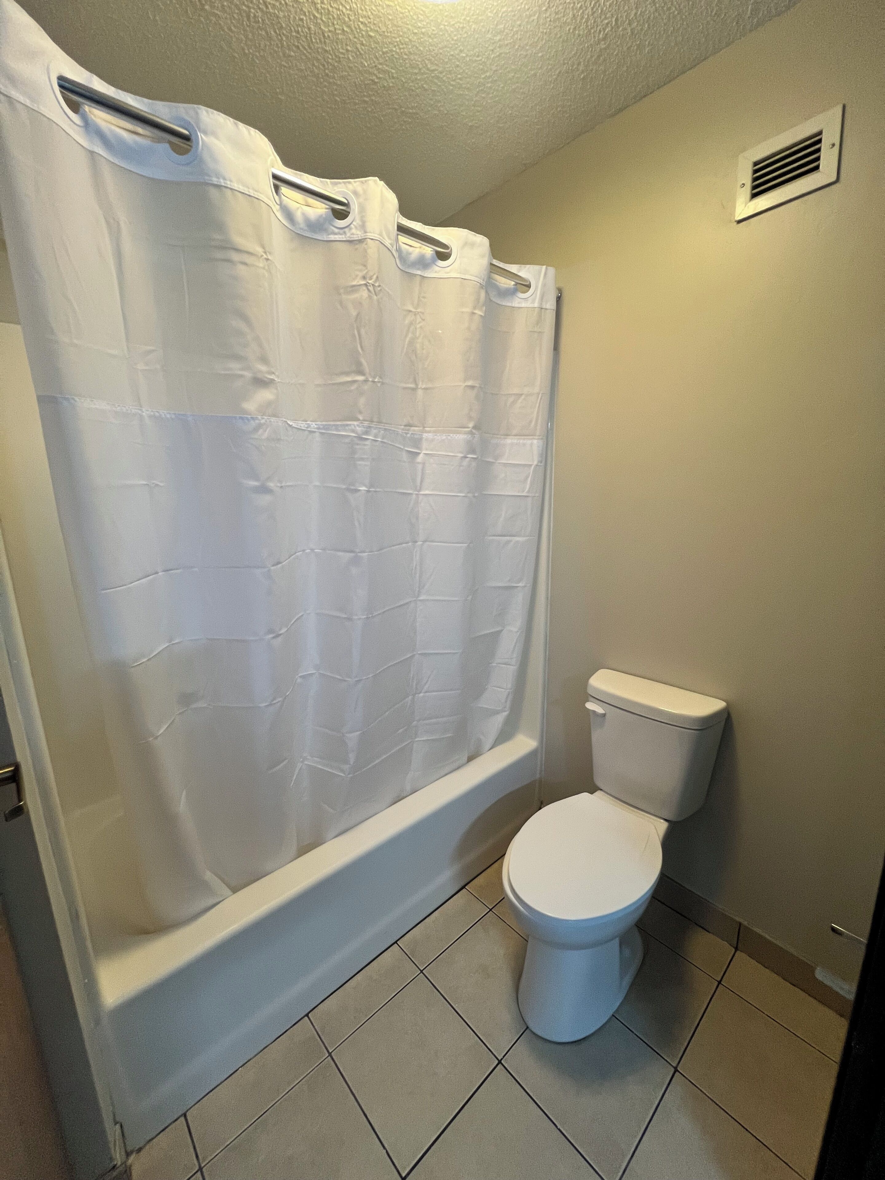 Hair dryer, towels, soap, shampoo