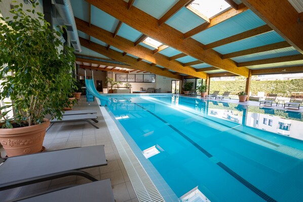 Indoor pool, free pool cabanas, pool umbrellas