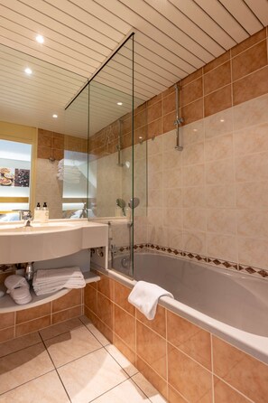 Family Room, Multiple Beds, Non Smoking (Living Room;with Sofabed) | Bathroom | Eco-friendly toiletries, hair dryer, bathrobes, slippers