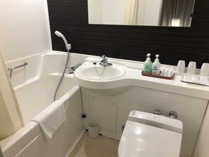 Triple Room, Smoking | Bathroom | Combined shower/tub, free toiletries, hair dryer, slippers