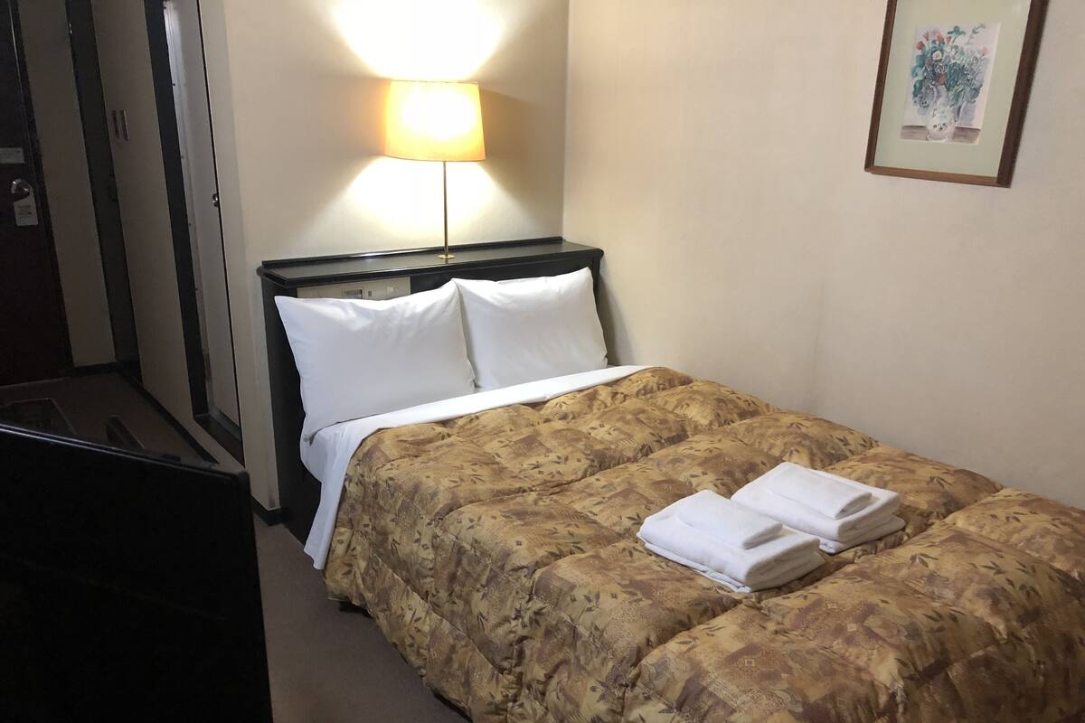 Desk, blackout curtains, iron/ironing board (on request), free WiFi