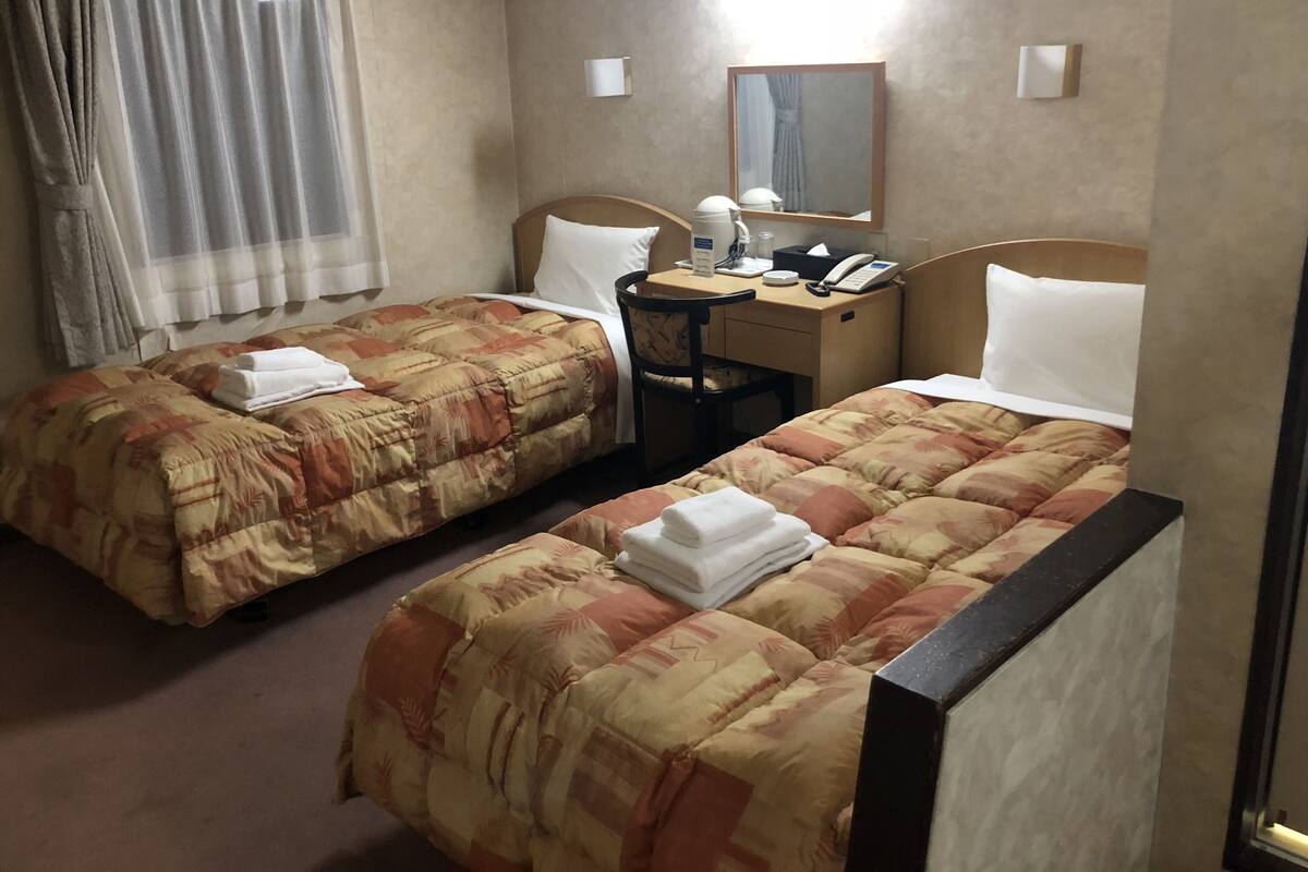 Desk, blackout curtains, iron/ironing board (on request), free WiFi