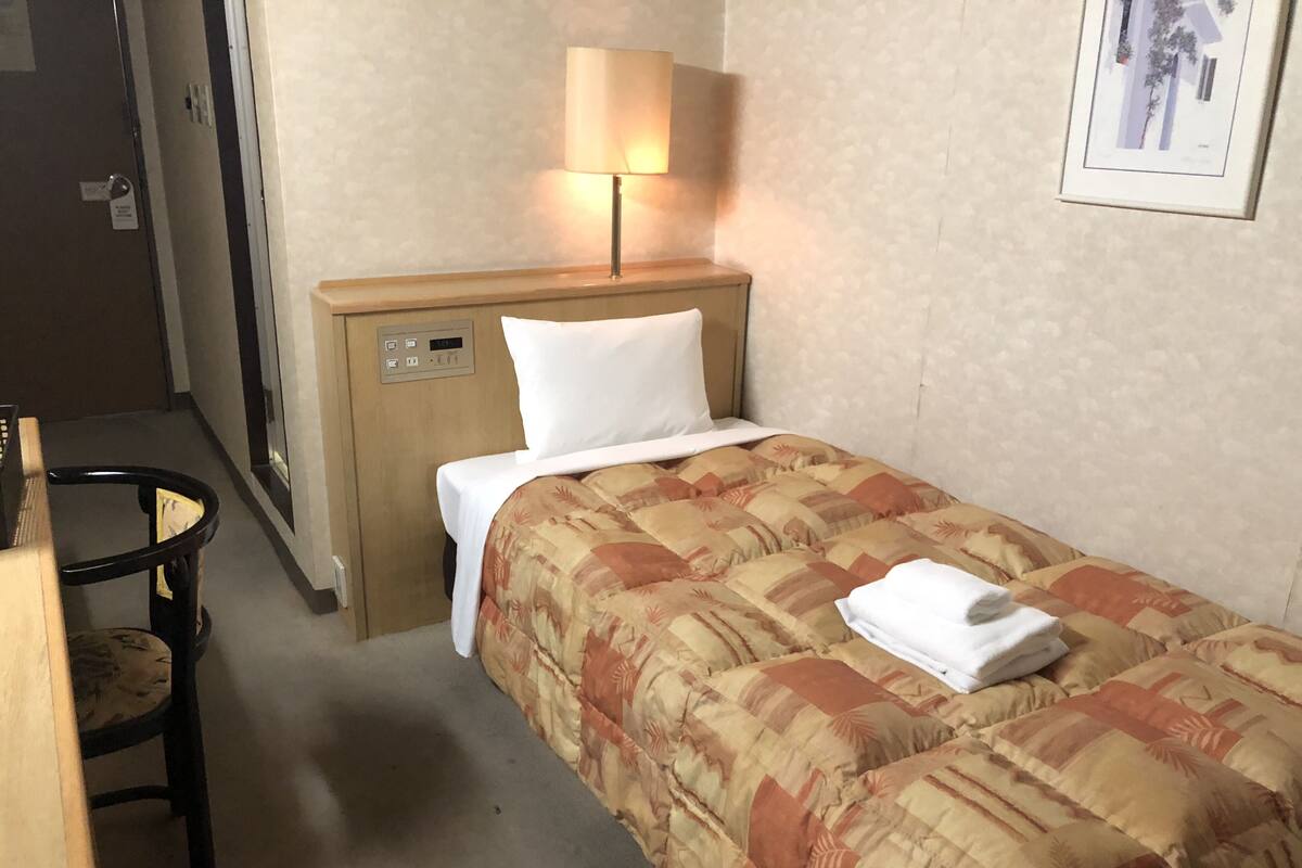 Desk, blackout curtains, iron/ironing board (on request), free WiFi