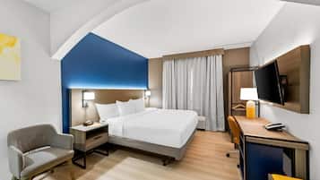 Suite, 1 king bed, Wheelchair accessible shower, non smoking | 1 bedroom, desk, laptop workspace, iron/ironing board