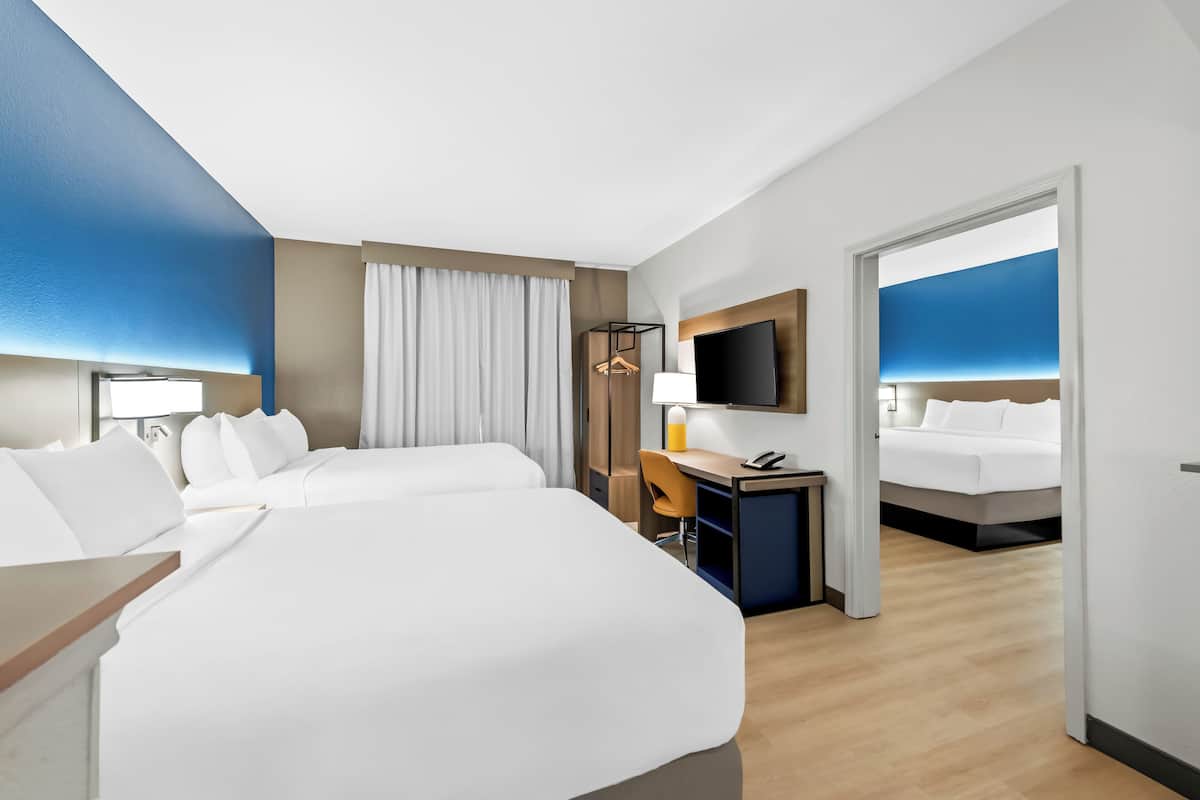 Suite, Multiple Beds, Accessible, Non Smoking | 1 bedroom, desk, laptop workspace, iron/ironing board