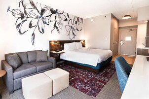 Room, 1 King Bed with Sofa bed | Living area | TV