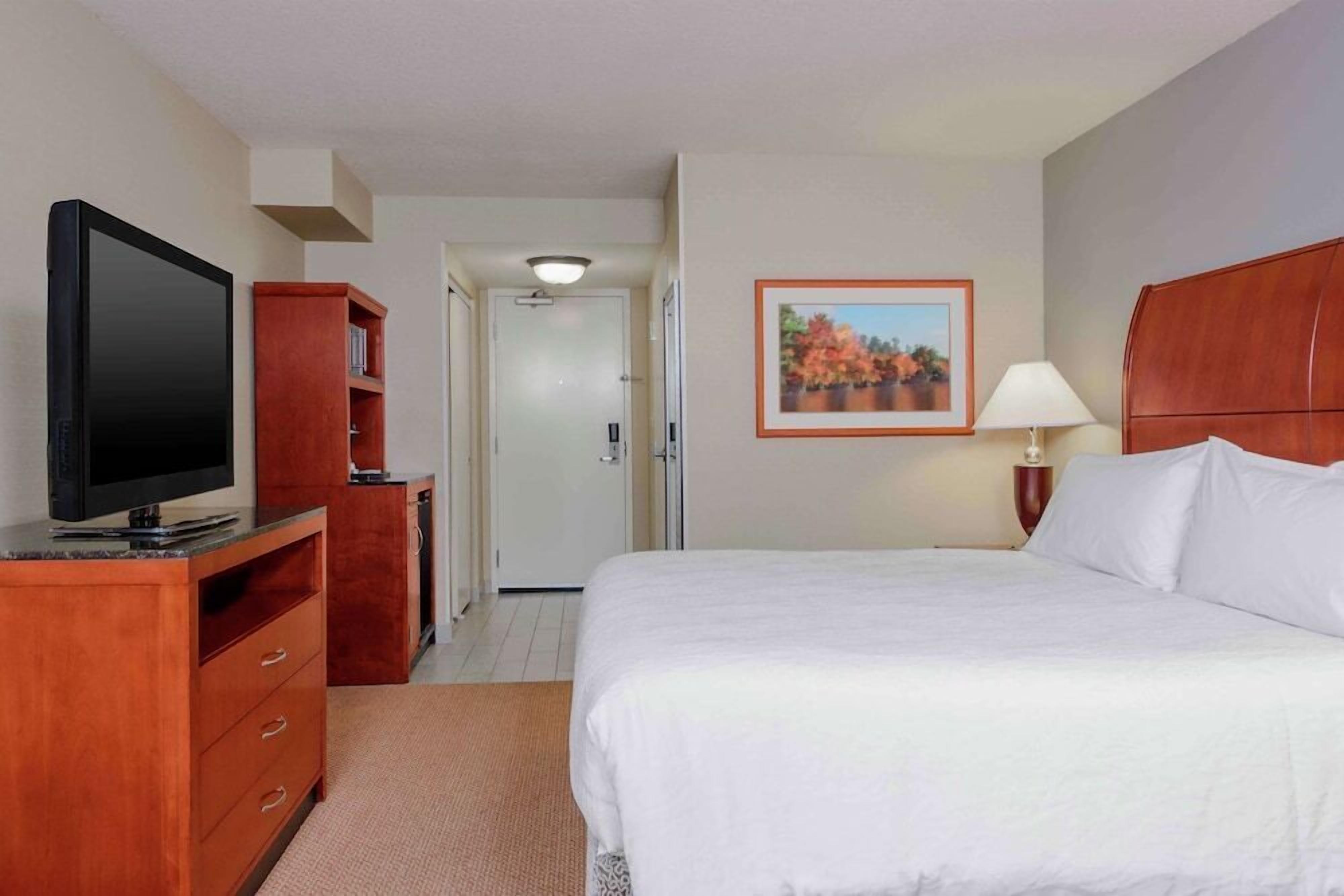 Hypo-allergenic bedding, pillow-top beds, in-room safe, desk
