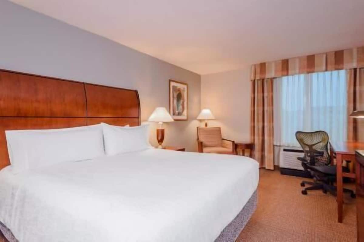 Hypo-allergenic bedding, pillow-top beds, in-room safe, desk