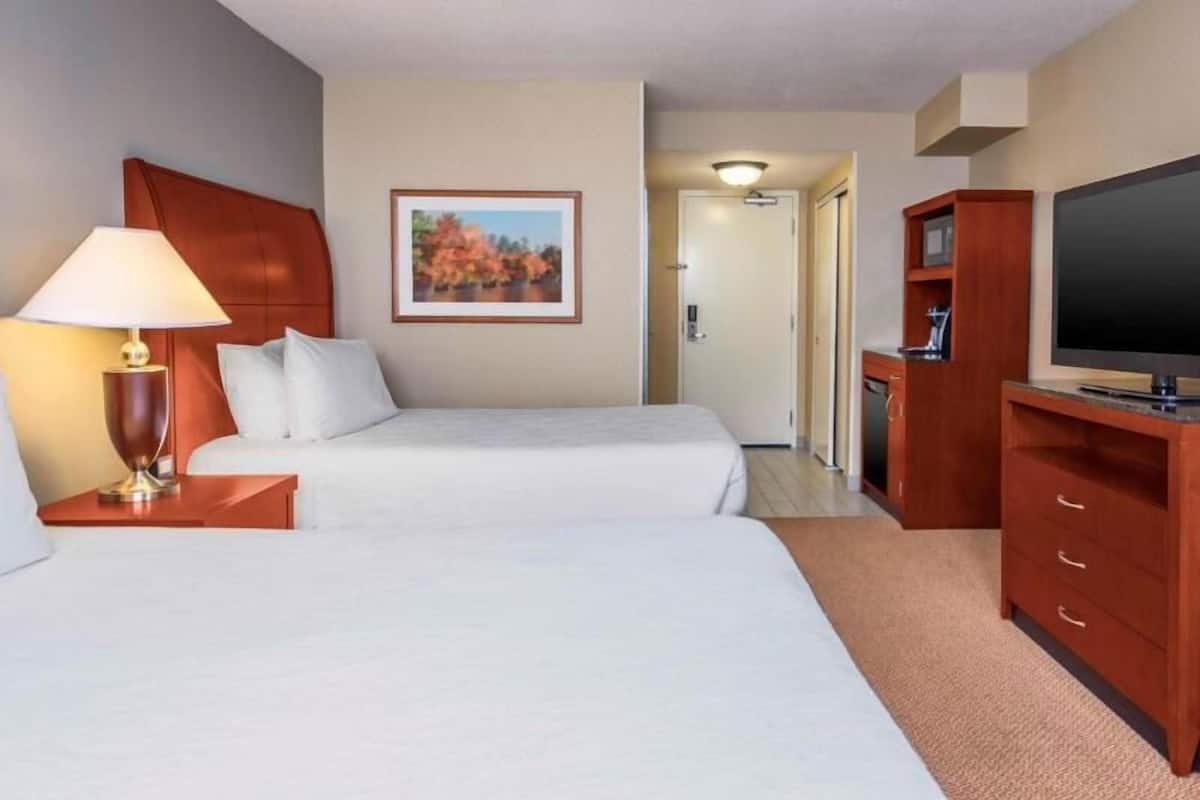 Hypo-allergenic bedding, pillow-top beds, in-room safe, desk