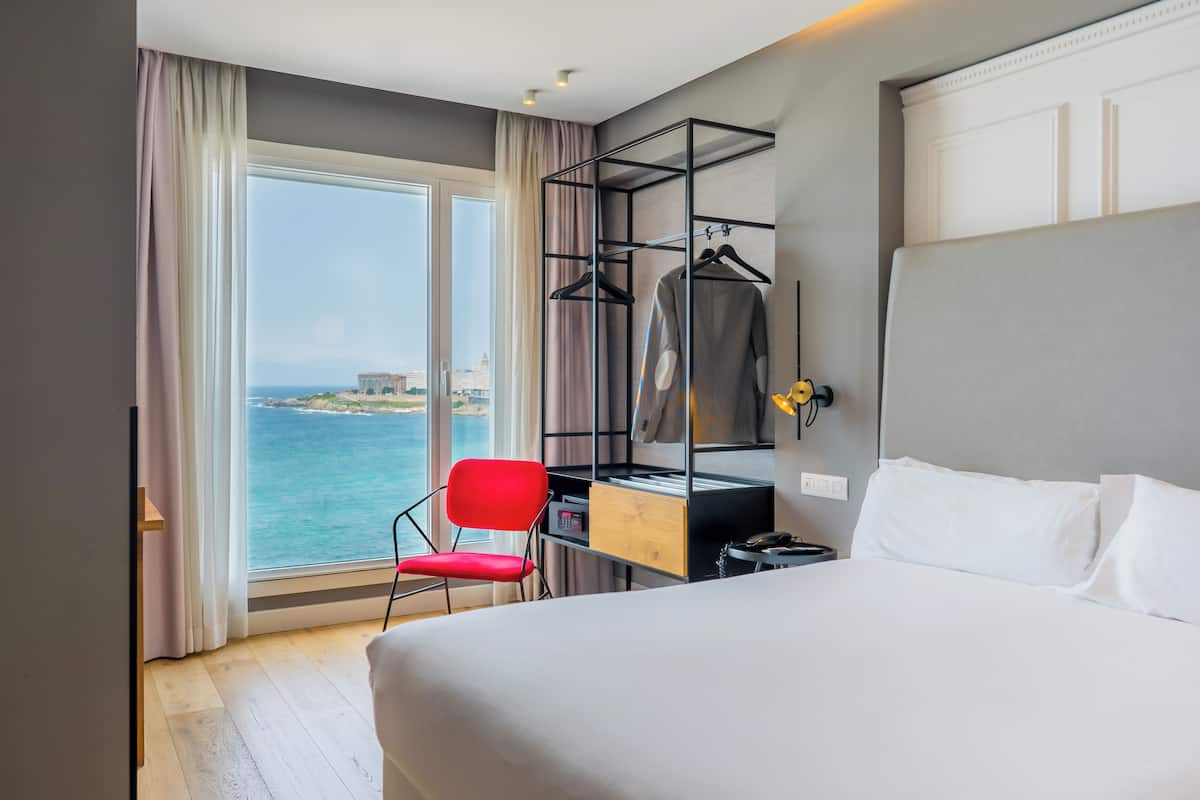 Family Room (2 adults + 2 children) | Minibar, in-room safe, desk, blackout curtains