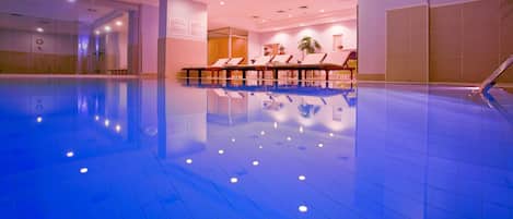 Indoor pool, open 10:00 AM to 9:00 PM, pool loungers, lifeguards on site